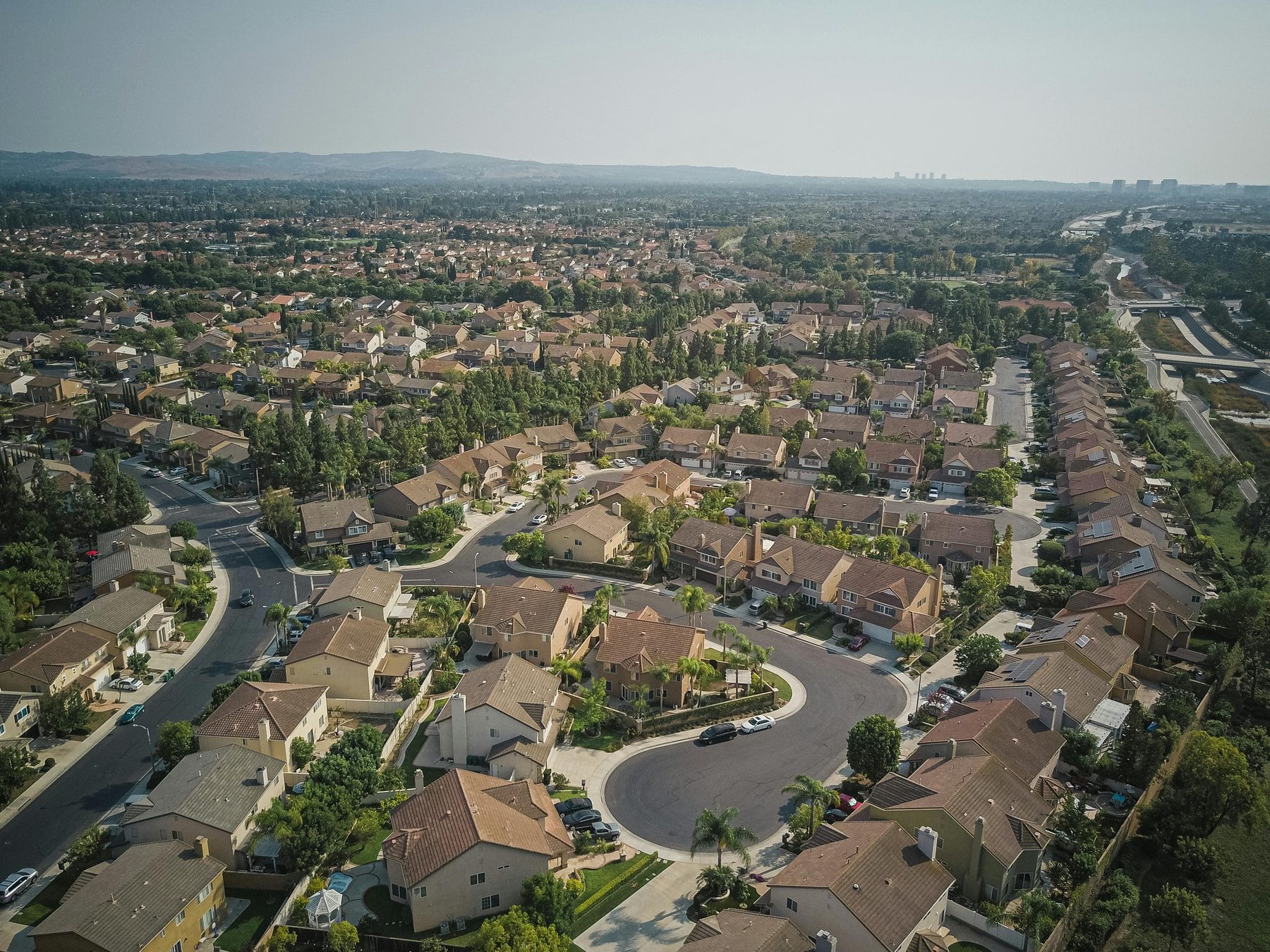 A cul-de-sac of homes, seen from above.